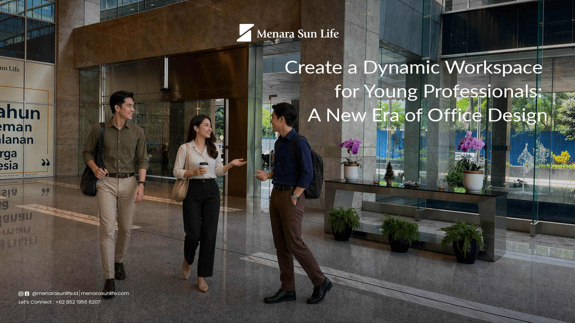 Young professionals walking through the stylish lobby of Menara Sun Life, showcasing a dynamic and modern office design.